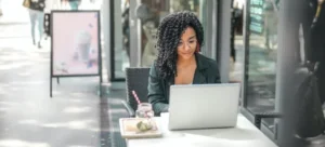 A woman checking the Internet to choose the right movers when moving to North Las Vegas